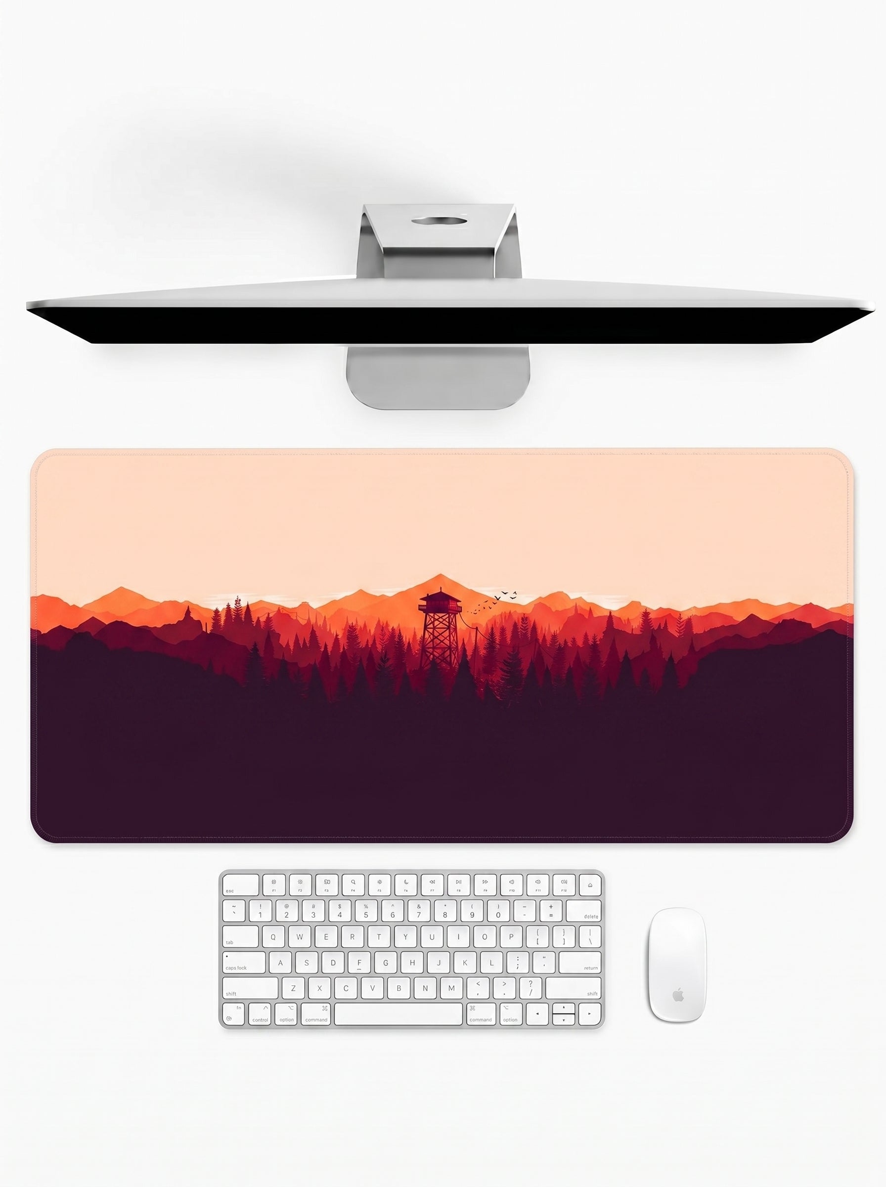 Amber Horizon deskmat featuring mountain silhouettes, forest scenery, and sunset-inspired artwork
