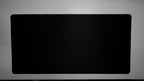 Jet Black deskmat featuring a minimalist all-black design