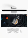 Deep Space Topo deskmat featuring planets, stars, and layered cosmic landscape artwork