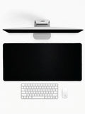 Jet Black deskmat featuring a minimalist all-black design
