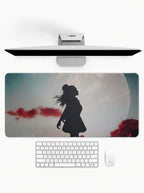 Lunar Silhouette deskmat featuring a moonlit silhouette figure with artistic landscape artwork and stitched edges