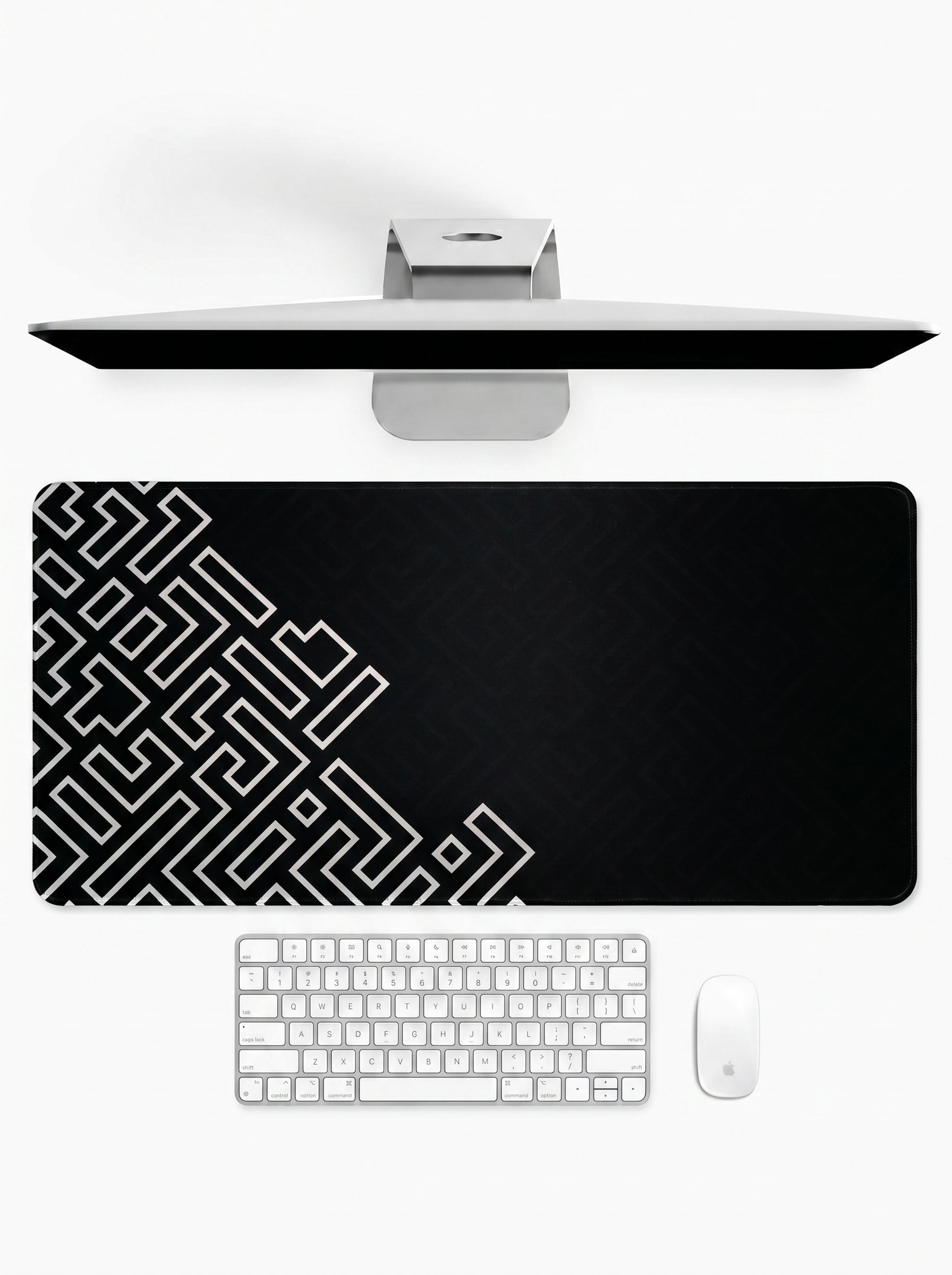 Onyx Maze deskmat featuring geometric maze-inspired artwork with black and white minimalist design