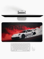 Phantom 911 deskmat featuring a white sports car drifting through red smoke