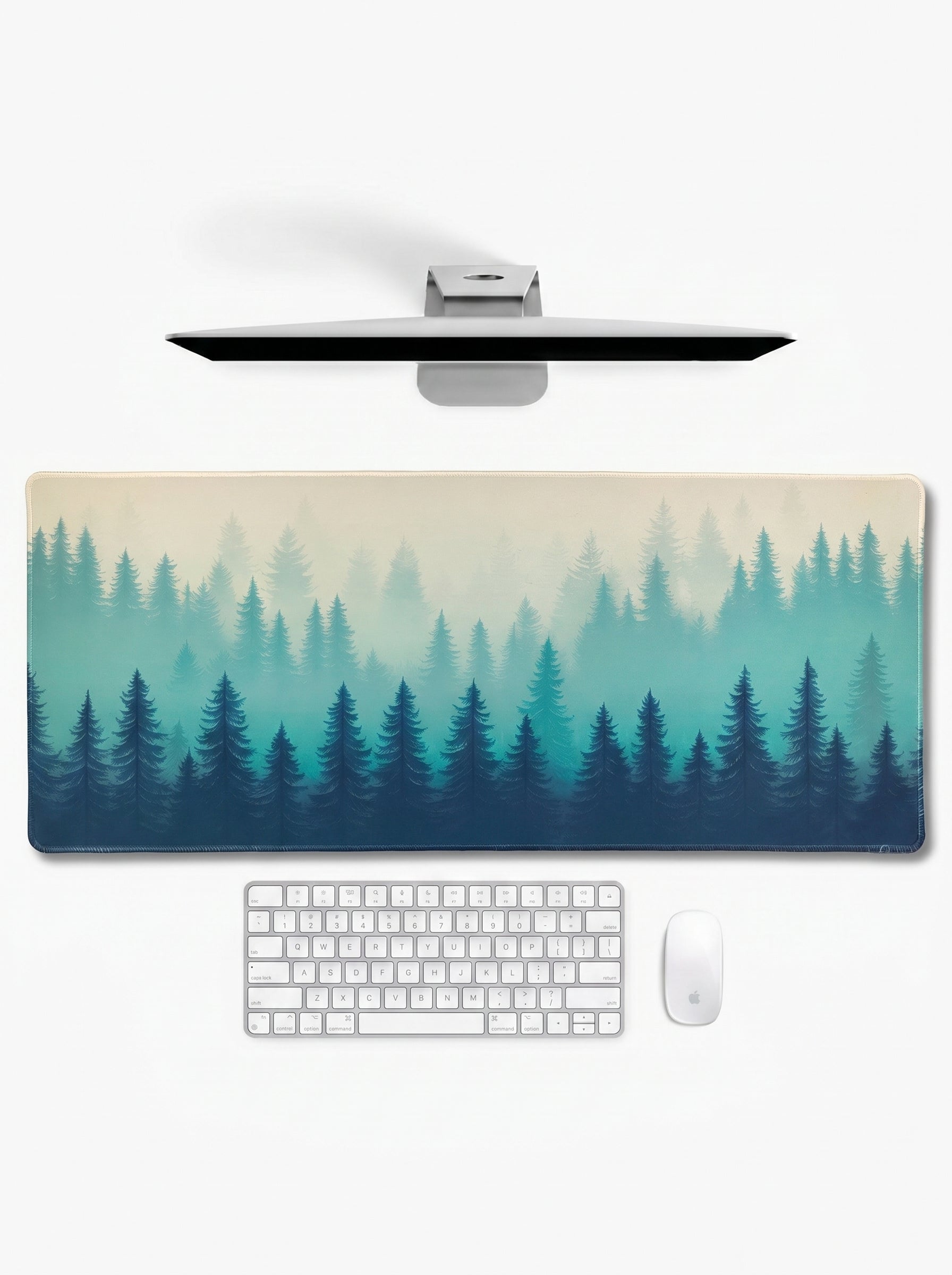 Serene Forest XL deskmat featuring misty pine forests in calming blue tones
