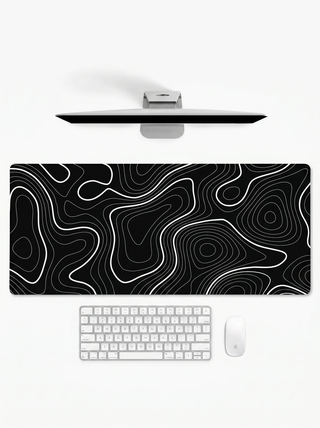 Topography XL deskmat featuring white contour lines on a black background