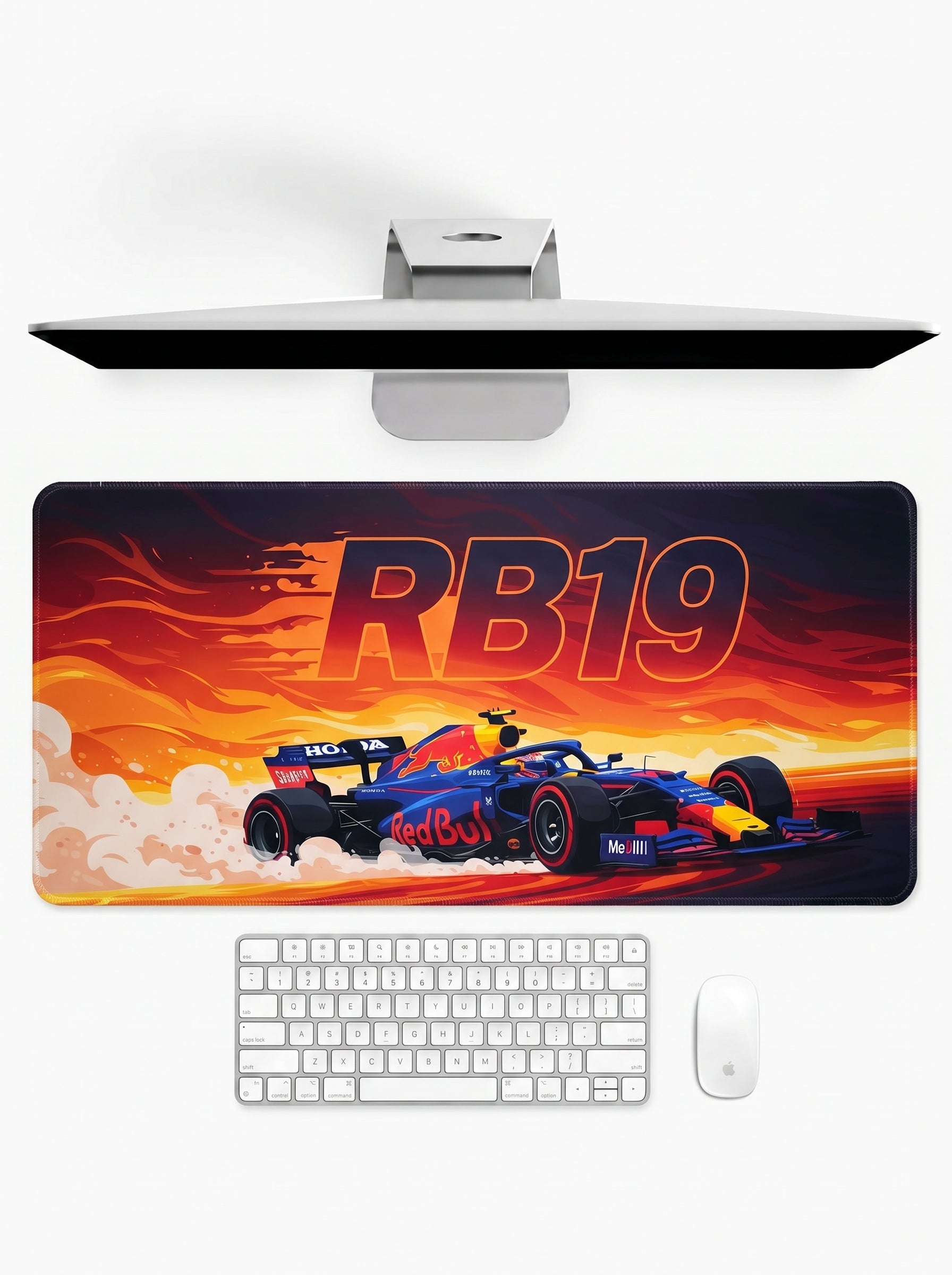 F1 car-themed desk setup with monitor, keyboard, and mouse on a white background